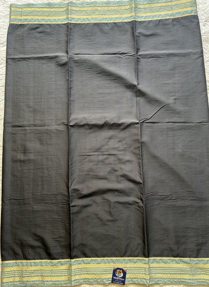 Semi Georgette Saree Elephant Gray Colored elegantly adorned with a Zari Border. - Sampradaya Designer Studio