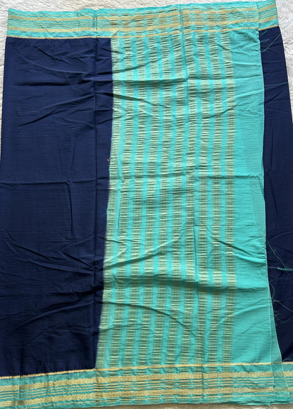 Semi Georgette Saree Royal Blue Colored elegantly adorned with a Zari Border. - Sampradaya Designer Studio