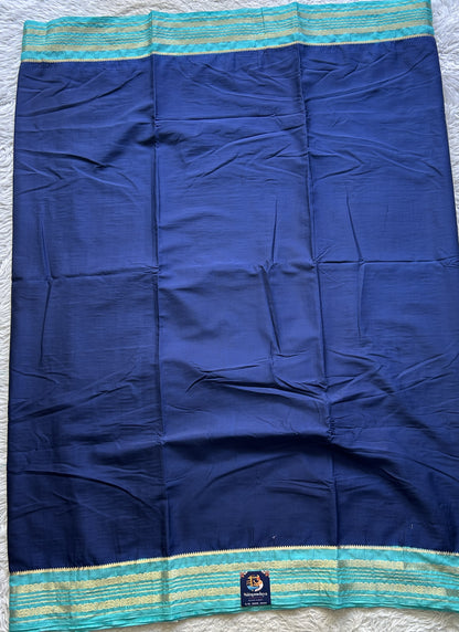 Semi Georgette Saree Royal Blue Colored elegantly adorned with a Zari Border. - Sampradaya Designer Studio