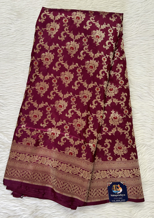 Banarasi Katan Silk Saree Magenta colored Saree complemented with a Gold Zari border. - Sampradaya Designer Studio