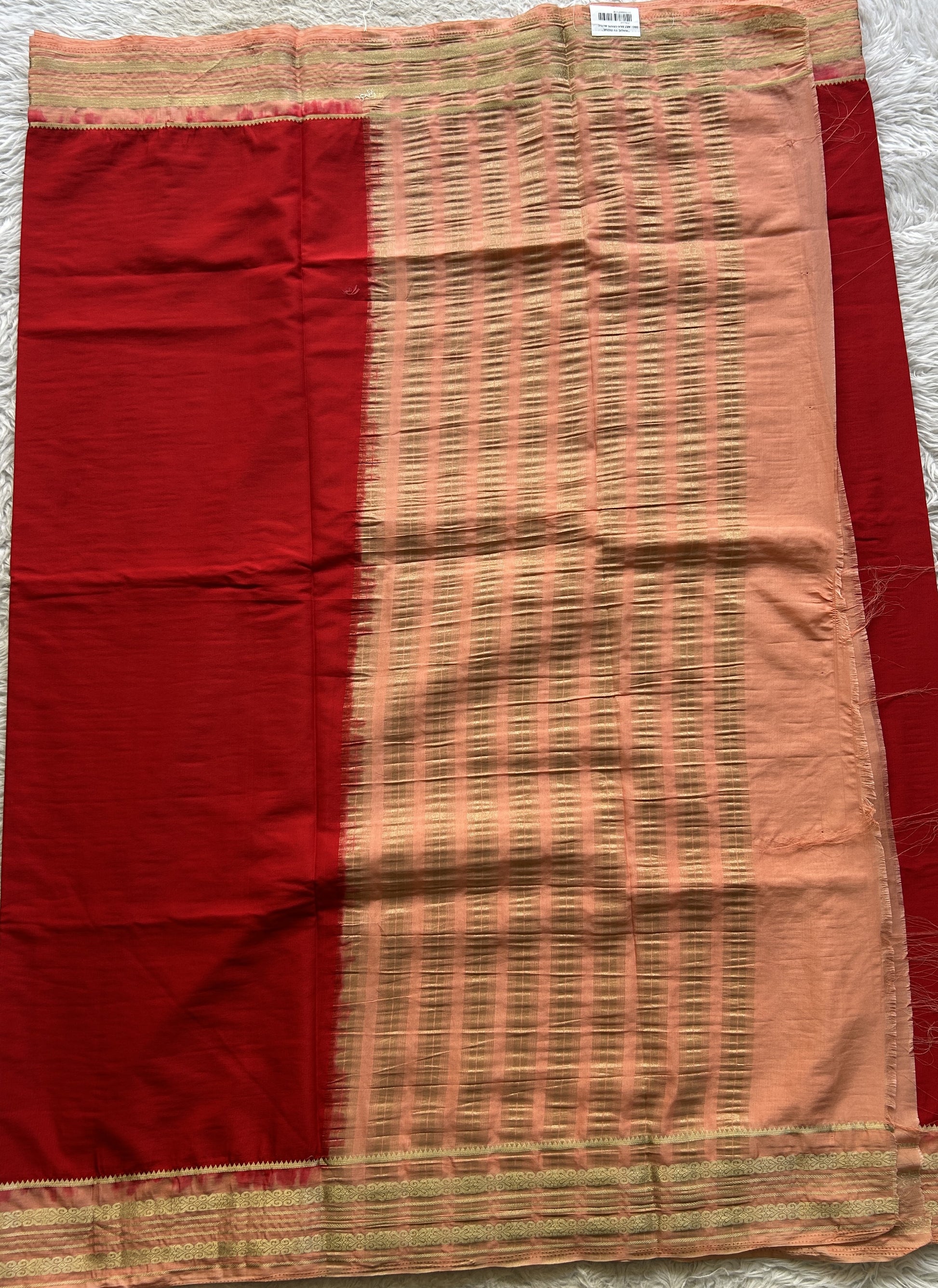 Semi Georgette Saree Red Colored elegantly adorned with a Zari Border. - Sampradaya Designer Studio