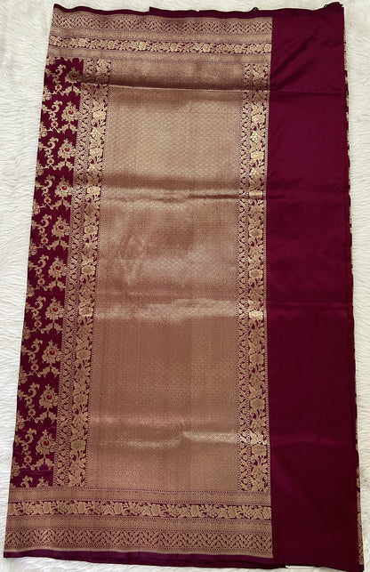 Banarasi Katan Silk Saree Magenta colored Saree complemented with a Gold Zari border. - Sampradaya Designer Studio