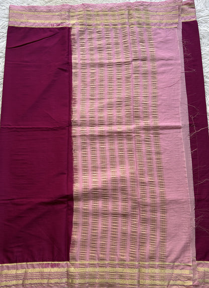 Semi Georgette Saree Mulberry Colored elegantly adorned with a Zari Border. - Sampradaya Designer Studio
