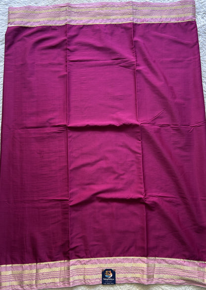 Semi Georgette Saree Mulberry Colored elegantly adorned with a Zari Border. - Sampradaya Designer Studio