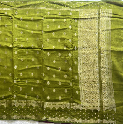 Banarasi Fancy Saree Strong Olive Green Colored Complemented with a Gold Zari Border.
