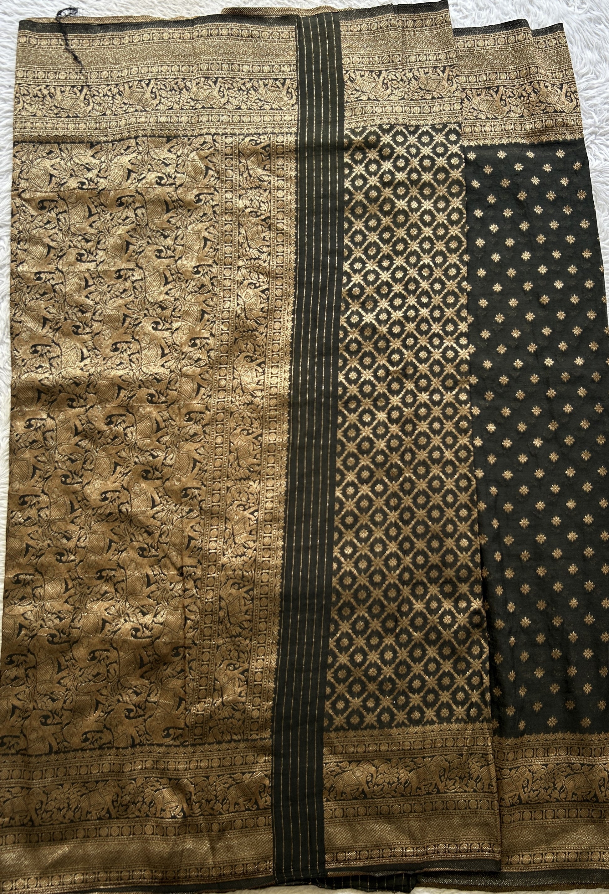 Semi Georgette Saree Black Colored elegantly adorned with a Zari Border. - Sampradaya Designer Studio