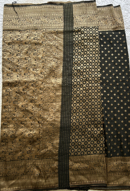 Semi Georgette Saree Black Colored elegantly adorned with a Zari Border. - Sampradaya Designer Studio