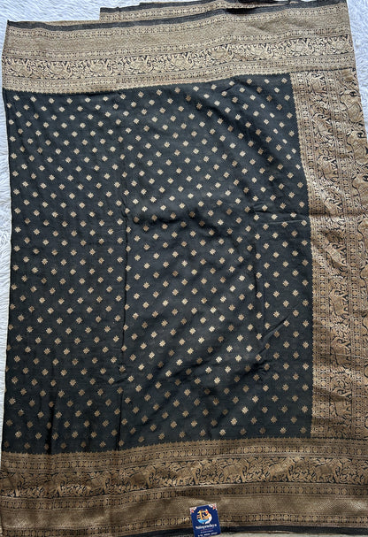 Semi Georgette Saree Black Colored elegantly adorned with a Zari Border. - Sampradaya Designer Studio