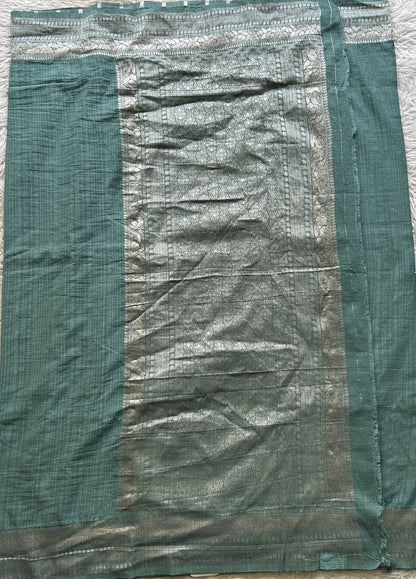 Semi Georgette Saree Sea Blue Colored elegantly adorned with a Zari Border. - Sampradaya Designer Studio