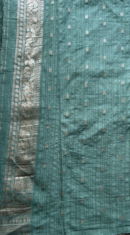 Semi Georgette Saree Sea Blue Colored elegantly adorned with a Zari Border. - Sampradaya Designer Studio