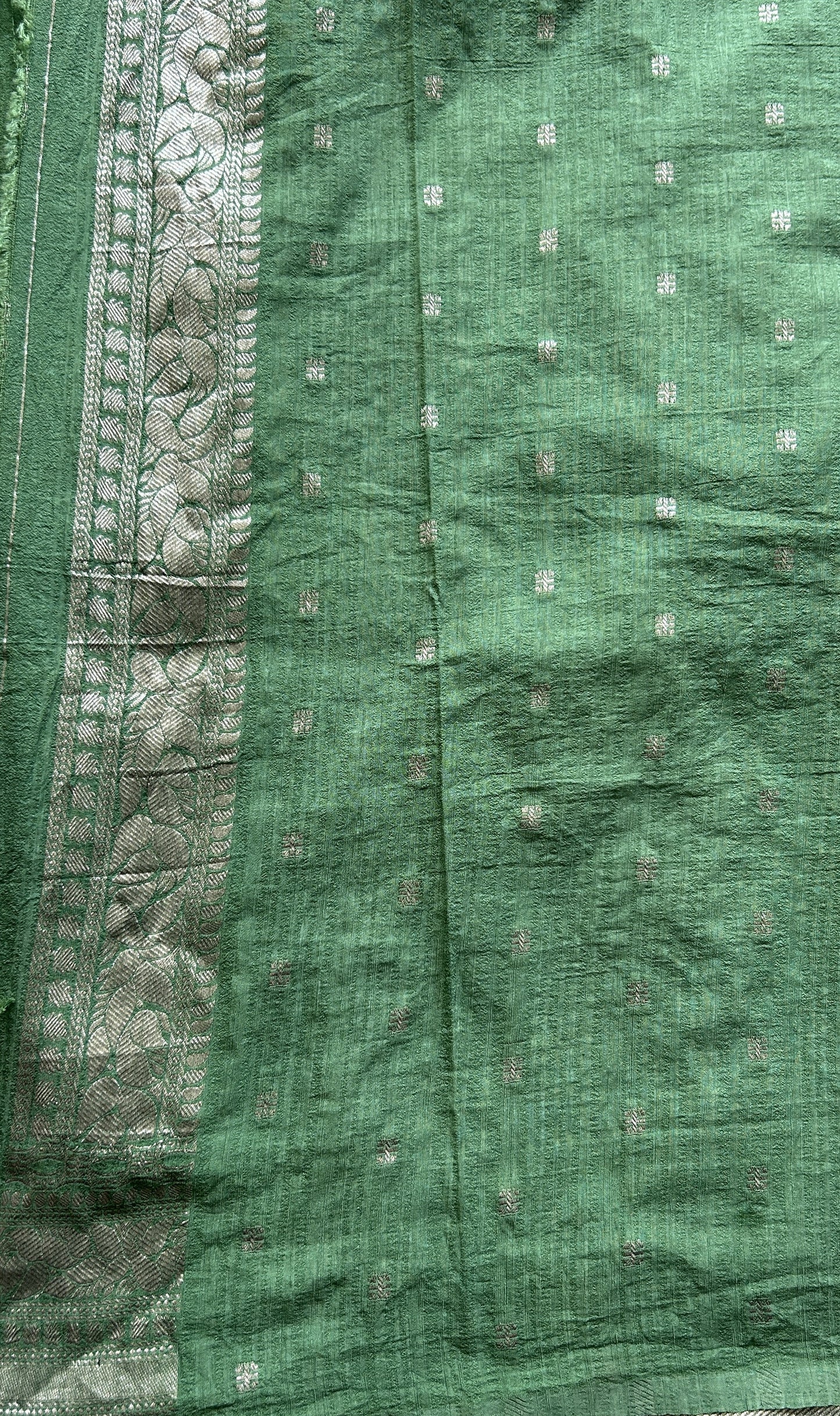 Semi Georgette Saree Sea Green Colored elegantly adorned with a Zari Border. - Sampradaya Designer Studio
