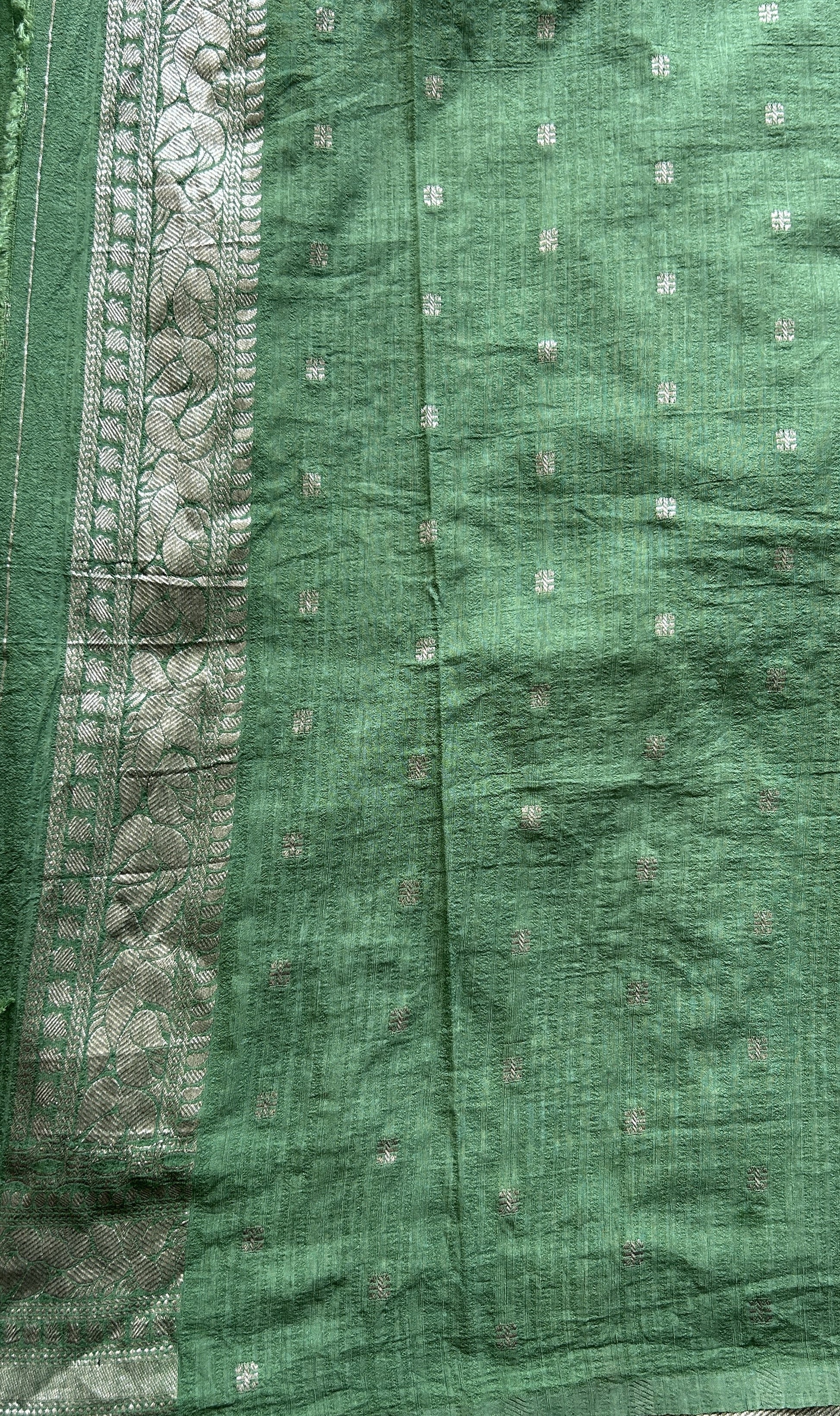Semi Georgette Saree Sea Green Colored elegantly adorned with a Zari Border. - Sampradaya Designer Studio