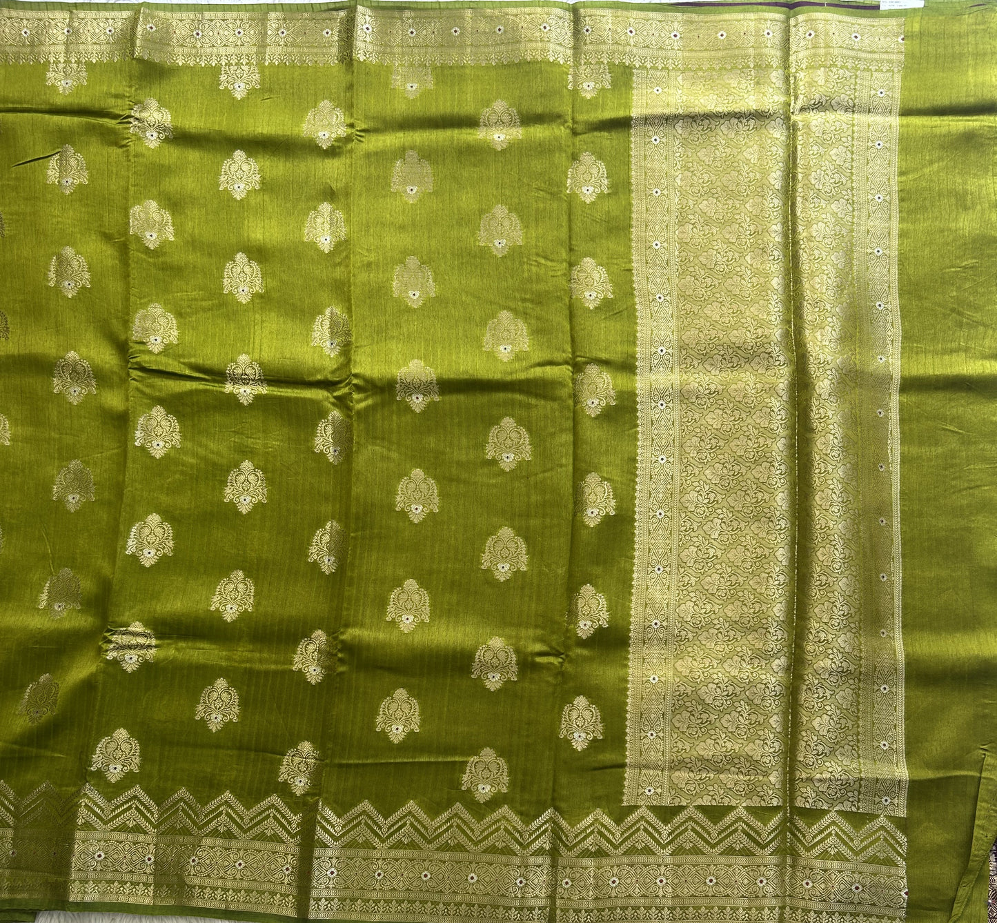 Banarasi Fancy Saree Olive Green Colored Complemented with a Gold Zari Border. - Sampradaya Designer Studio