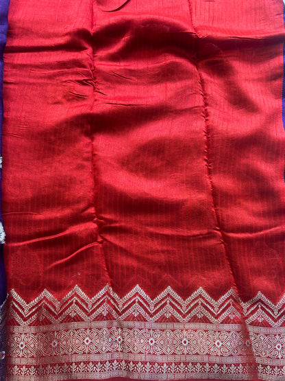 Banarasi Fancy Saree Russian Colored Complemented with a Silver Zari Border.