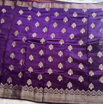 Banarasi Fancy Saree Russian Colored Complemented with a Silver Zari Border.