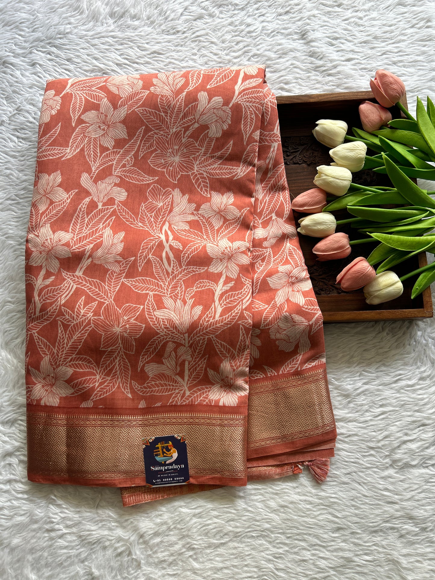 Dola Crepe Saree Light Orange Colored Complemented with a Zari Border. - Sampradaya Designer Studio