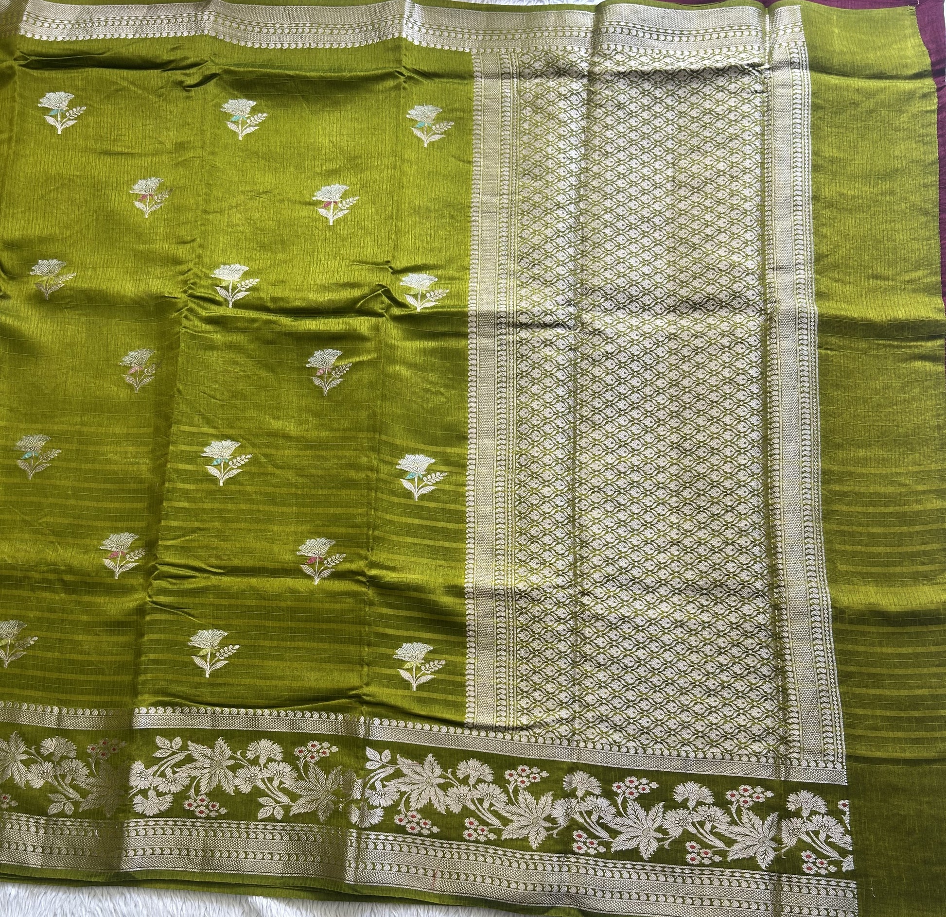 Banarasi Fancy Saree Olive Yellow Colored Complemented with a Silver Zari Border. - Sampradaya Designer Studio