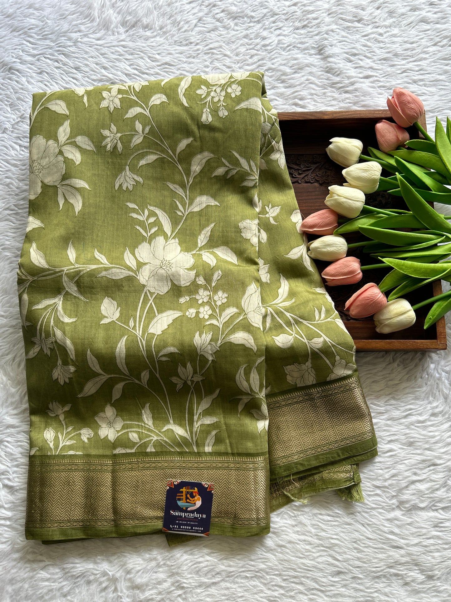Dola Crepe Saree Olive Green Colored Complemented with a Zari Border. - Sampradaya Designer Studio
