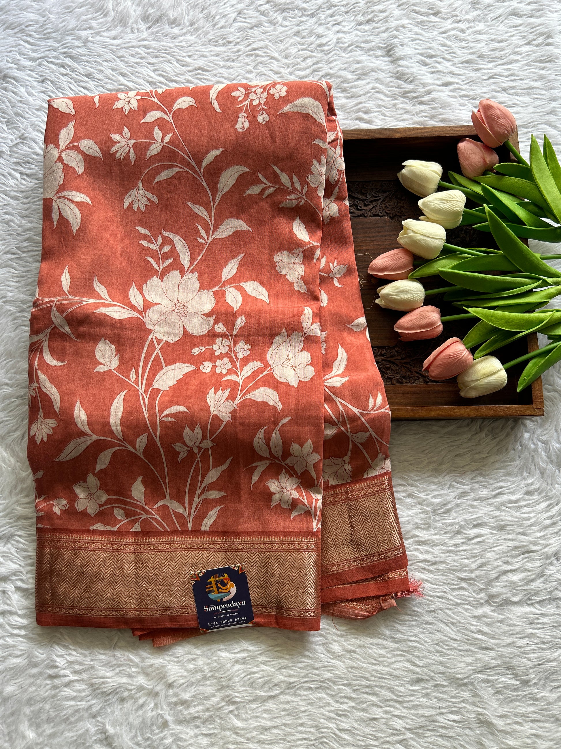 Dola Crepe Saree Peach Colored Complemented with a Zari Border. - Sampradaya Designer Studio