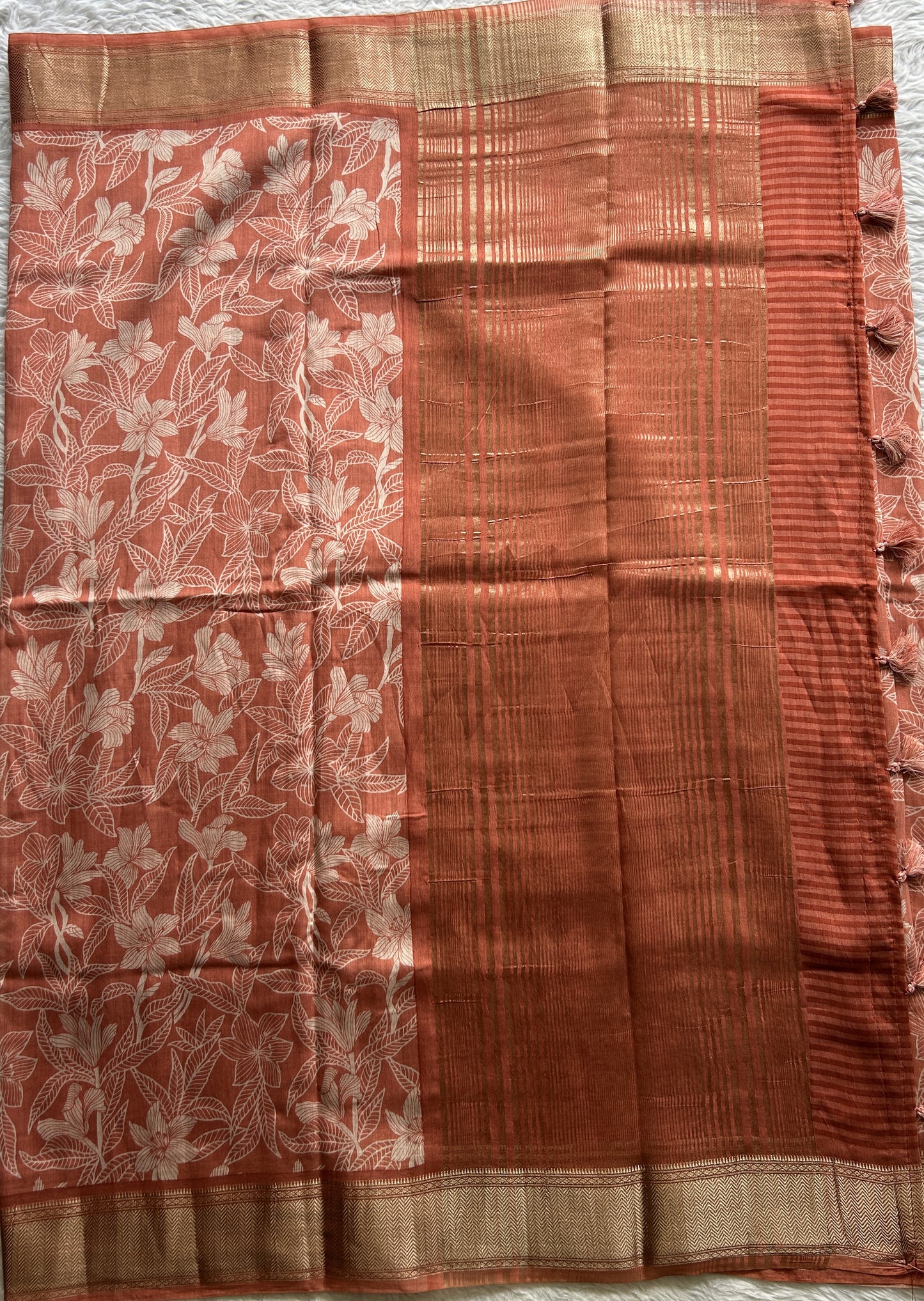 Dola Crepe Saree Light Orange Colored Complemented with a Zari Border. - Sampradaya Designer Studio