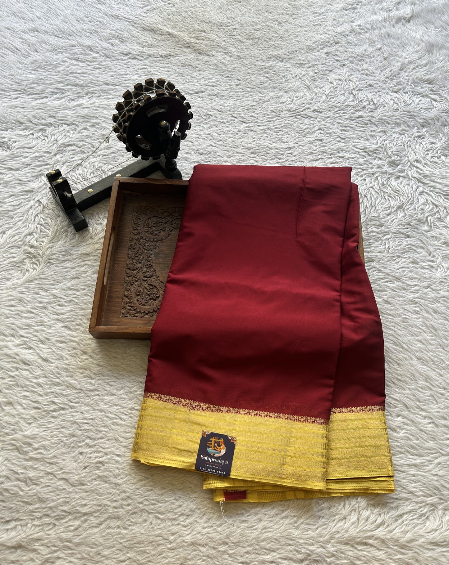 Semi Georgette Saree Maroon Colored Complemented with a Light Yellow Color Zari Border. - Sampradaya Designer Studio