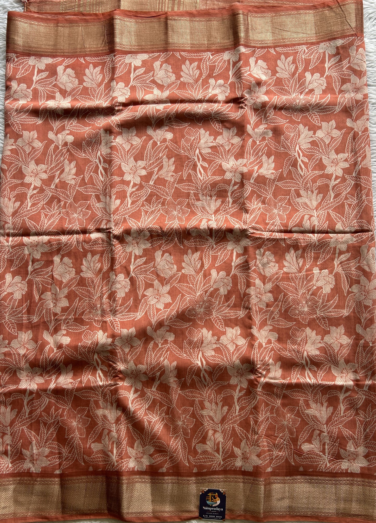Dola Crepe Saree Light Orange Colored Complemented with a Zari Border. - Sampradaya Designer Studio