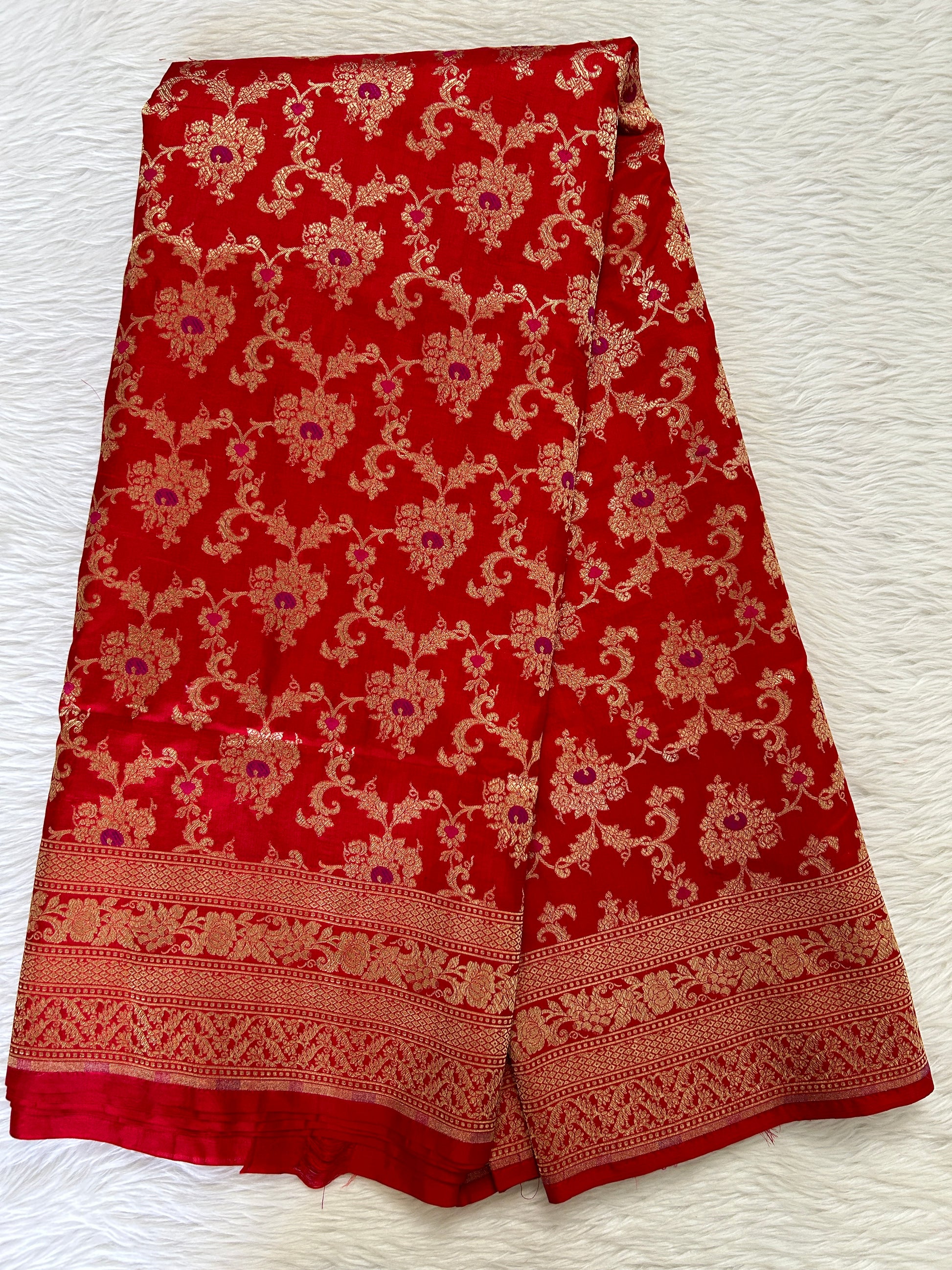 Banarasi Katan Silk Saree Red colored Saree complemented with a Gold Zari border. - Sampradaya Designer Studio