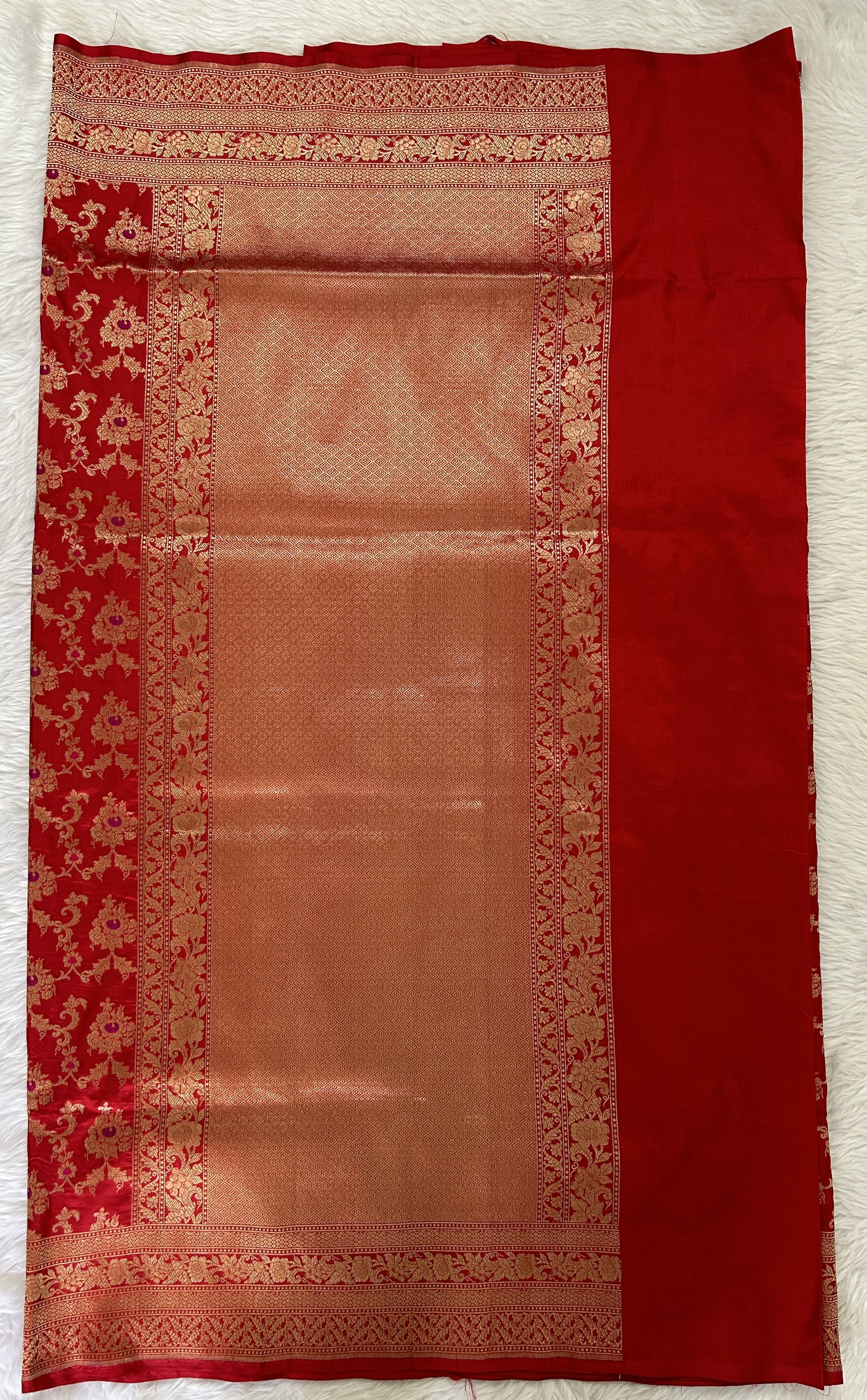 Banarasi Katan Silk Saree Red colored Saree complemented with a Gold Zari border. - Sampradaya Designer Studio
