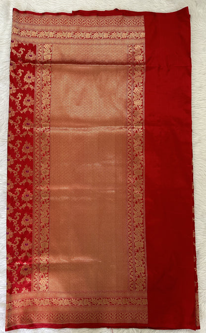 Banarasi Katan Silk Saree Red colored Saree complemented with a Gold Zari border. - Sampradaya Designer Studio