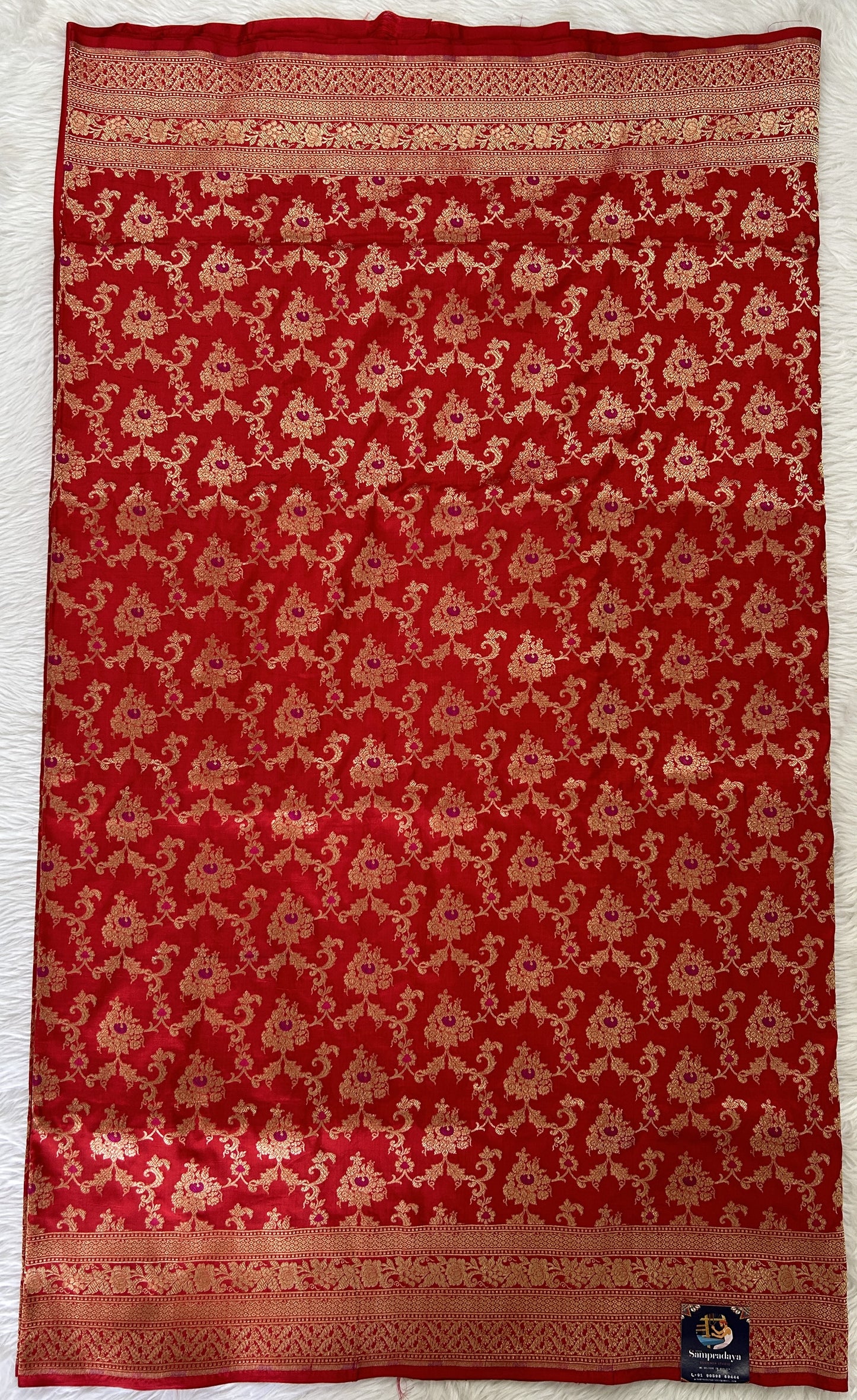 Banarasi Katan Silk Saree Red colored Saree complemented with a Gold Zari border. - Sampradaya Designer Studio