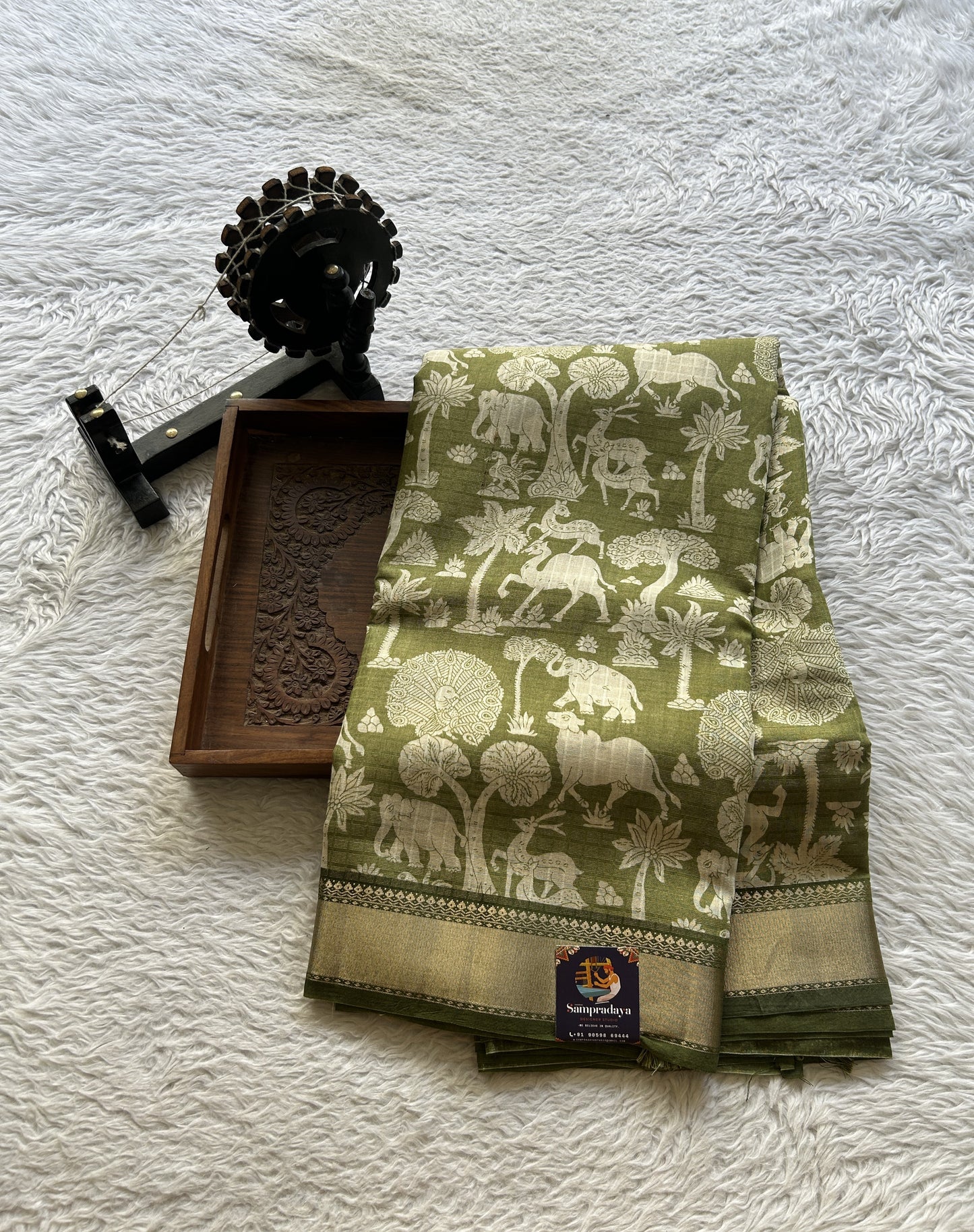 Dola Crepe Saree Jade Colored Elegantly Paired with a Zari Border. - Sampradaya Designer Studio