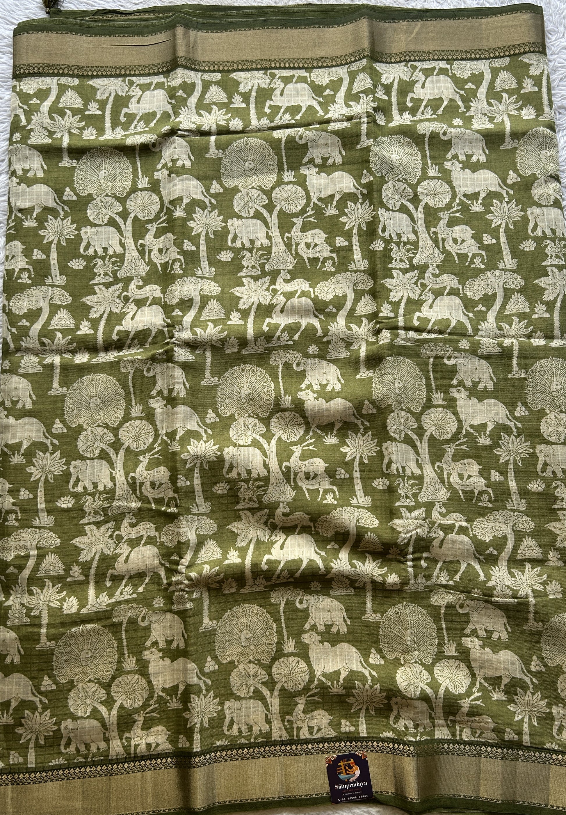 Dola Crepe Saree Jade Colored Elegantly Paired with a Zari Border. - Sampradaya Designer Studio