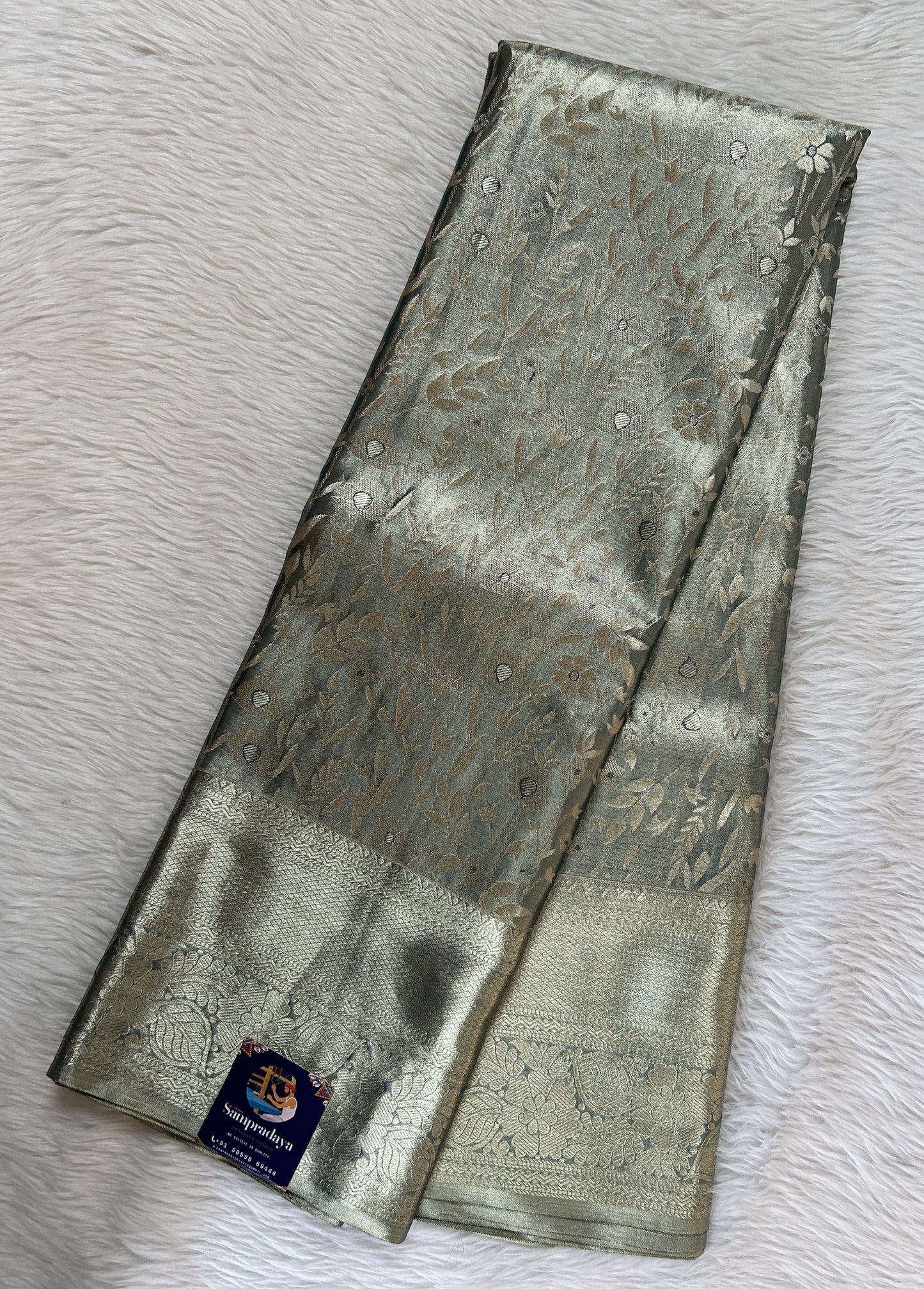 Kanjivaram Bridal Silk Saree Tea Green colored Saree complemented with a Gold Kanchi border. - Sampradaya Designer Studio