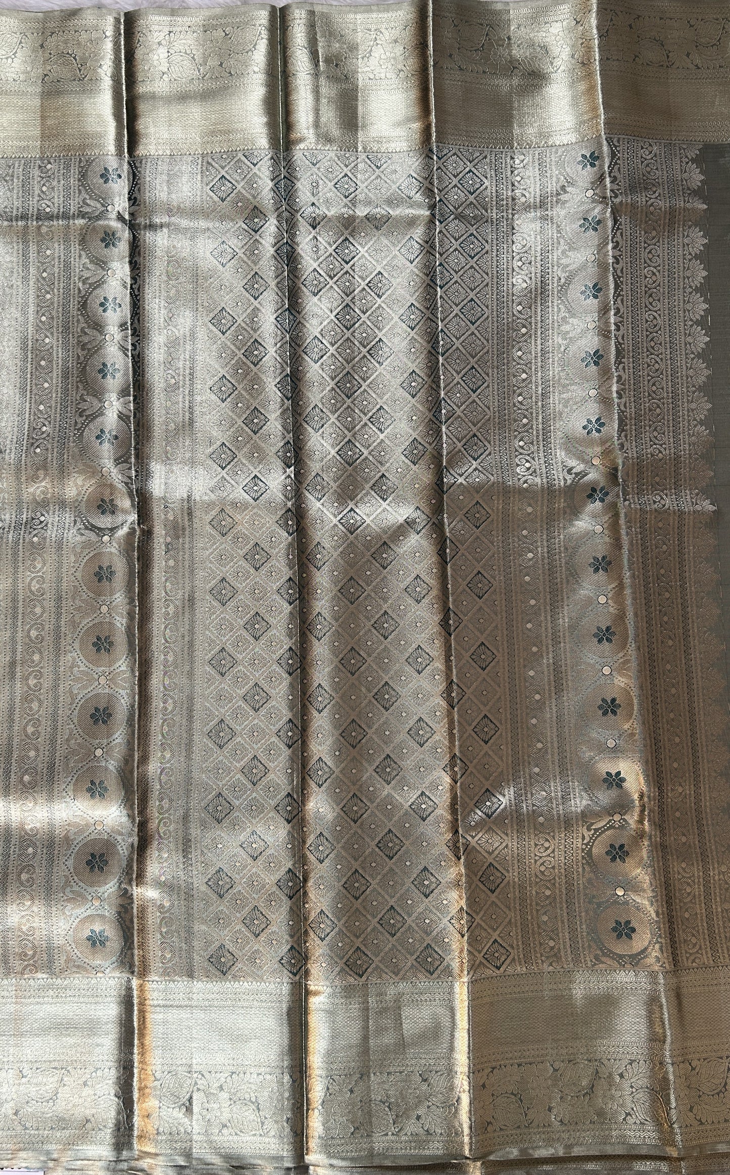 Kanjivaram Bridal Silk Saree Tea Green colored Saree complemented with a Gold Kanchi border. - Sampradaya Designer Studio