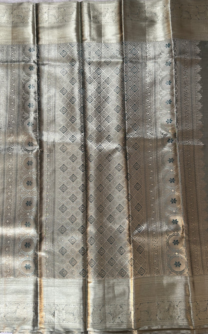 Kanjivaram Bridal Silk Saree Tea Green colored Saree complemented with a Gold Kanchi border. - Sampradaya Designer Studio
