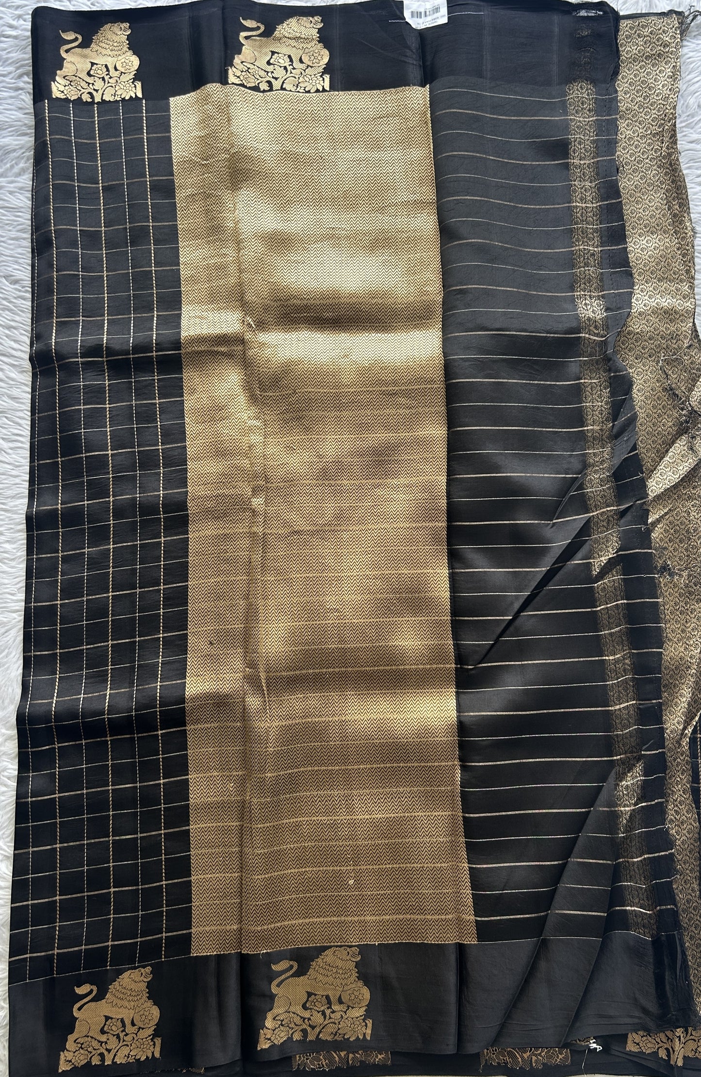 Raw Mango or Pooniya Silk Saree Black Colored Complemented With a Zari Border - Sampradaya Designer Studio