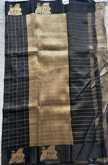 Raw Mango or Pooniya Silk Saree Black Colored Complemented With a Zari Border - Sampradaya Designer Studio