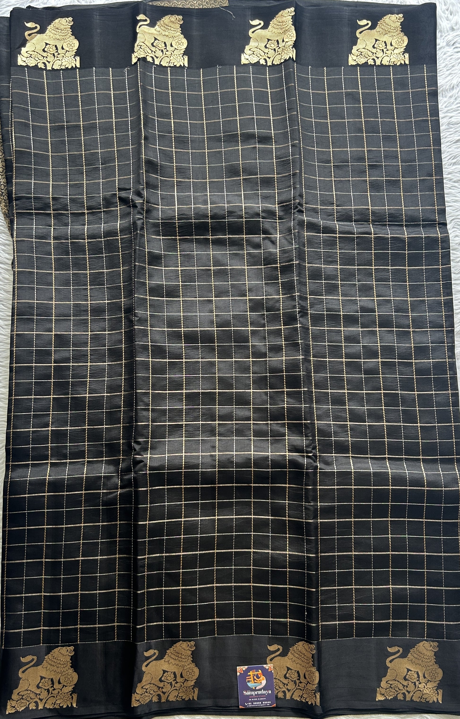 Raw Mango or Pooniya Silk Saree Black Colored Complemented With a Zari Border - Sampradaya Designer Studio