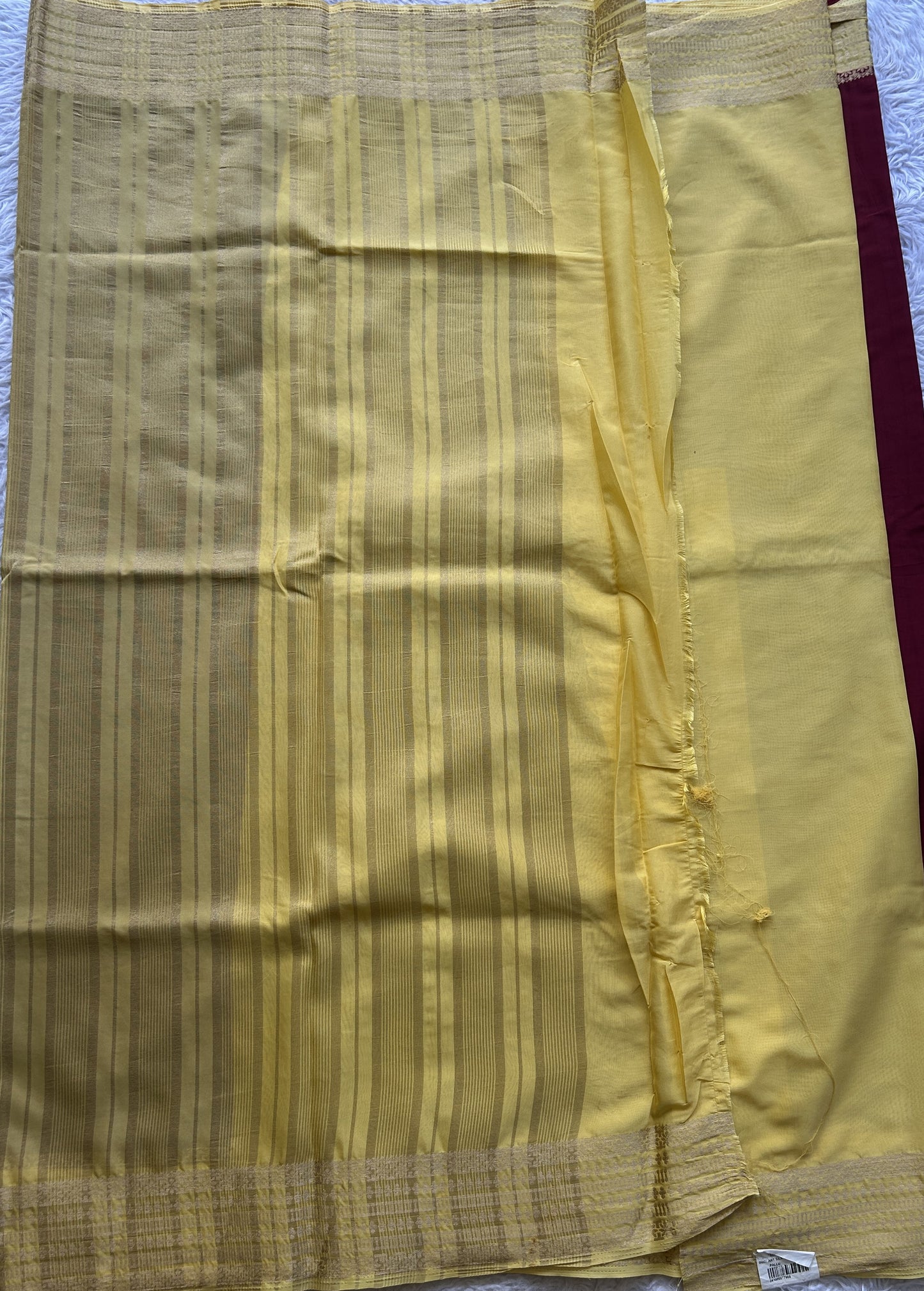 Semi Georgette Saree Maroon Colored Complemented with a Light Yellow Color Zari Border. - Sampradaya Designer Studio