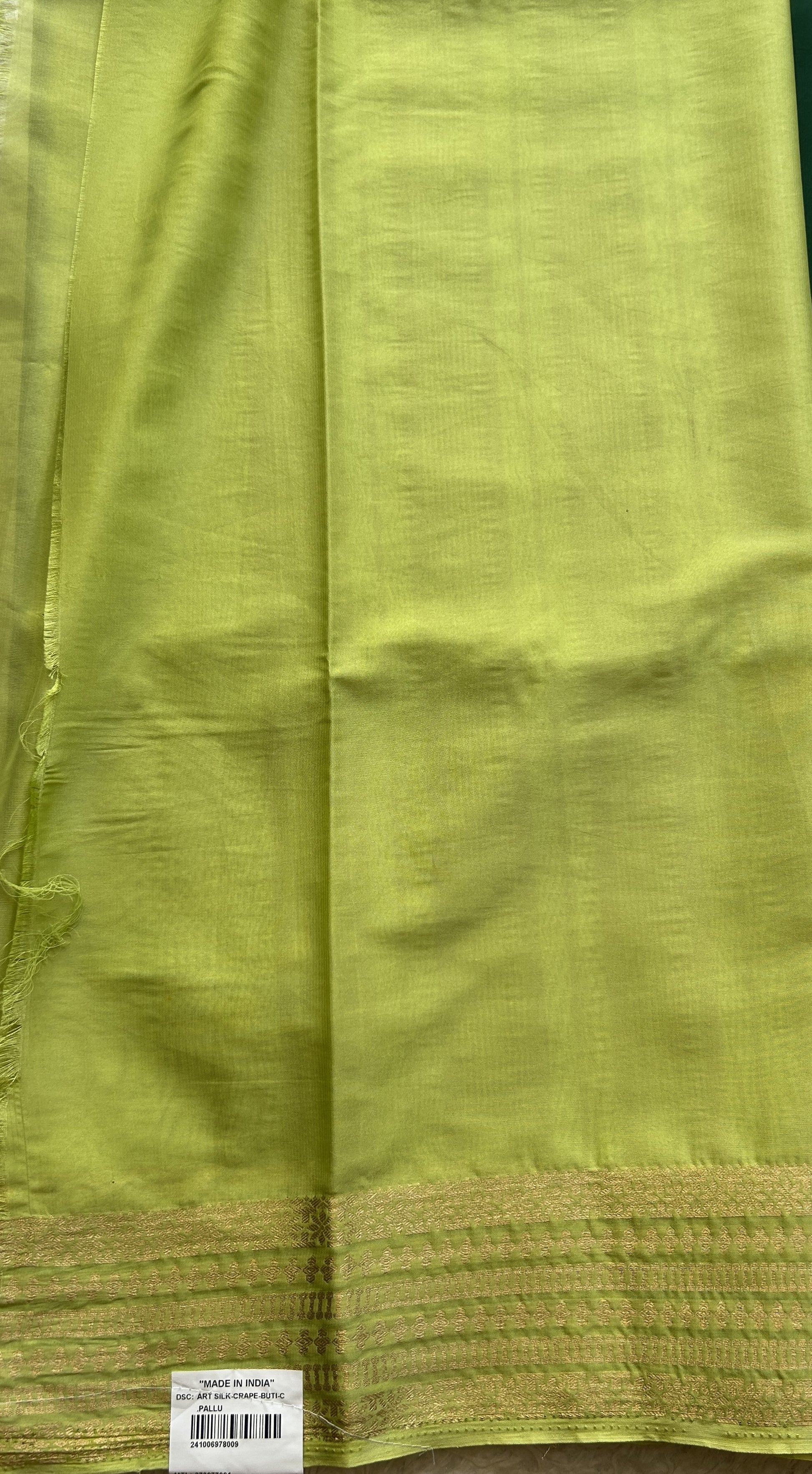 Semi Georgette Saree Dark Green Colored Complemented with a Lemon Green Color Zari Border. - Sampradaya Designer Studio