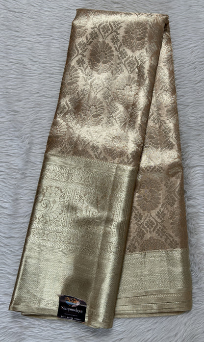 Kanjivaram Bridal Silk Saree Pastel Orange colored Saree complemented with a Light Gold Zari Kanchi border. - Sampradaya Designer Studio