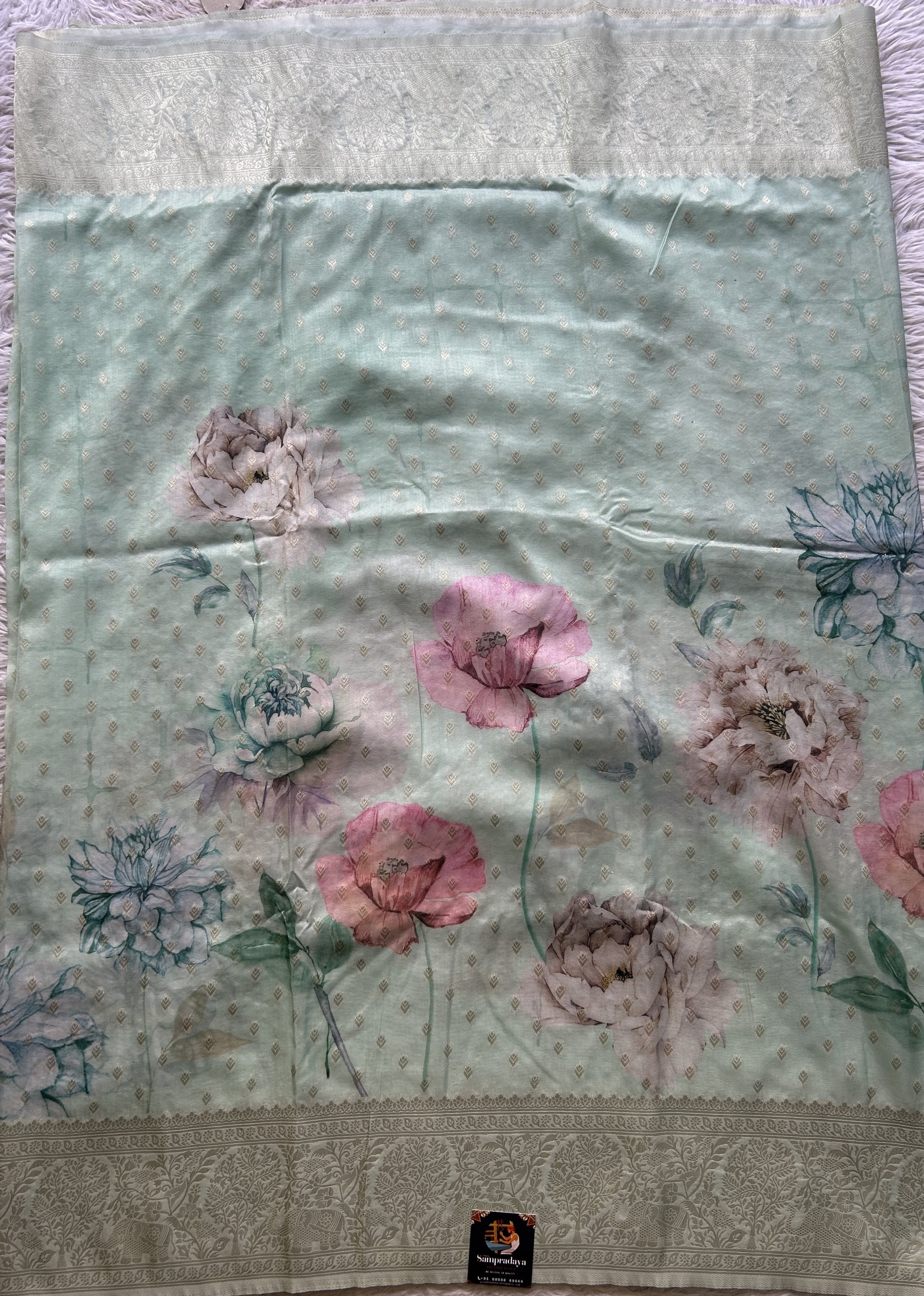 Semi Georgette Saree Very Light Green Colored Elegantly Paired with a Zari Border. - Sampradaya Designer Studio