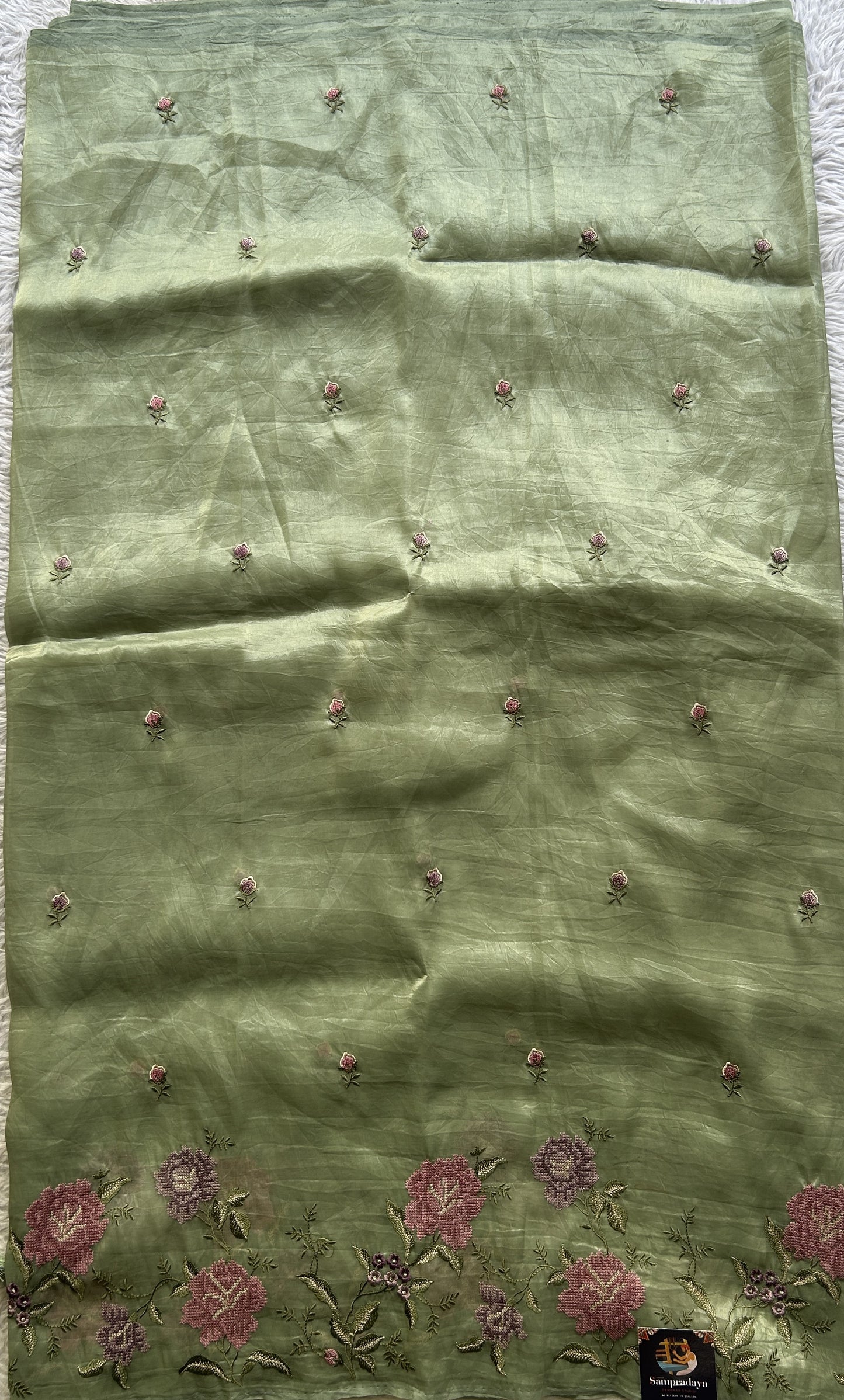 Inox Silk Saree Moss Green Colored Elegantly Paired with a Embroidered Border. - Sampradaya Designer Studio