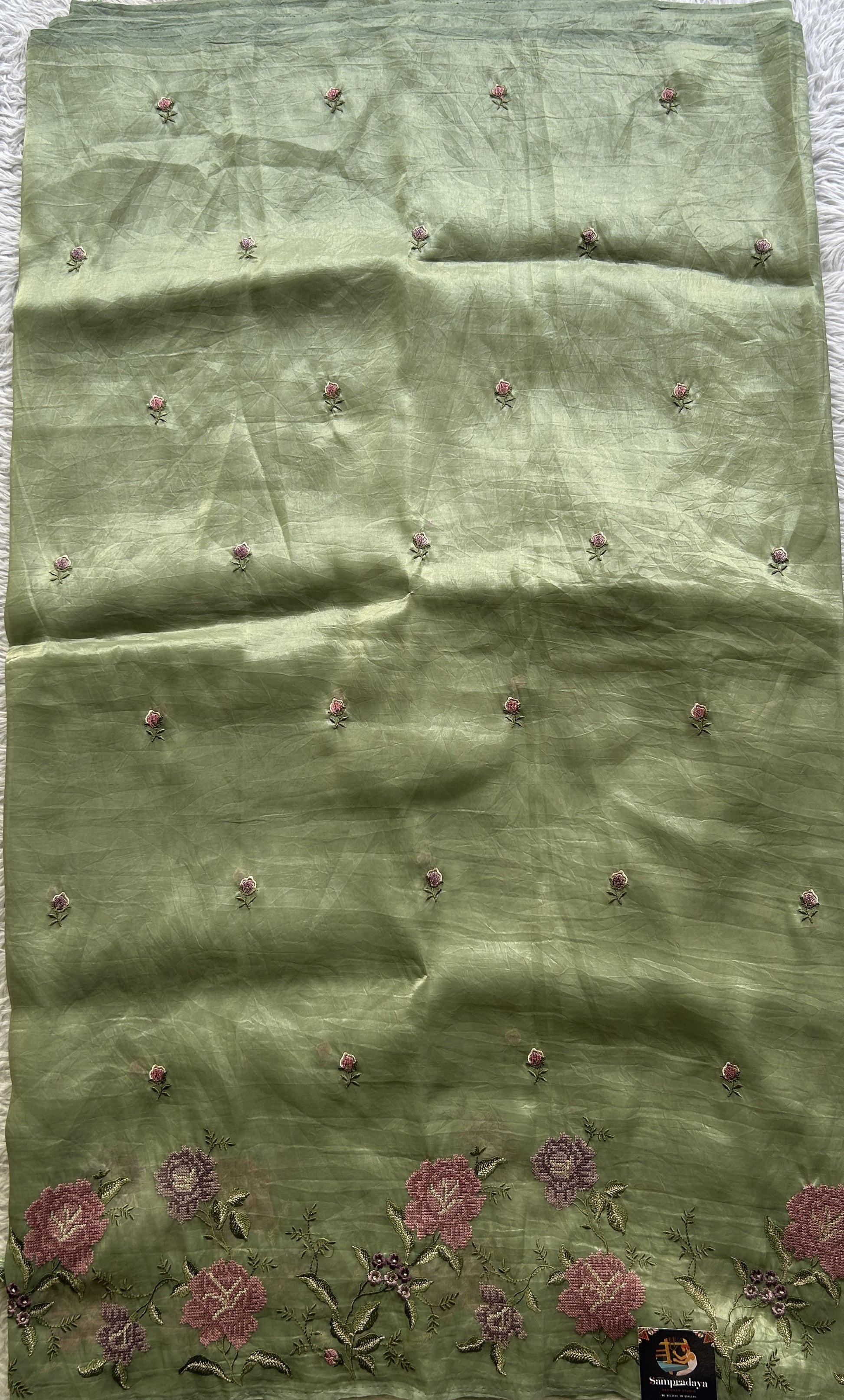 Inox Silk Saree Moss Green Colored Elegantly Paired with a Embroidered Border. - Sampradaya Designer Studio