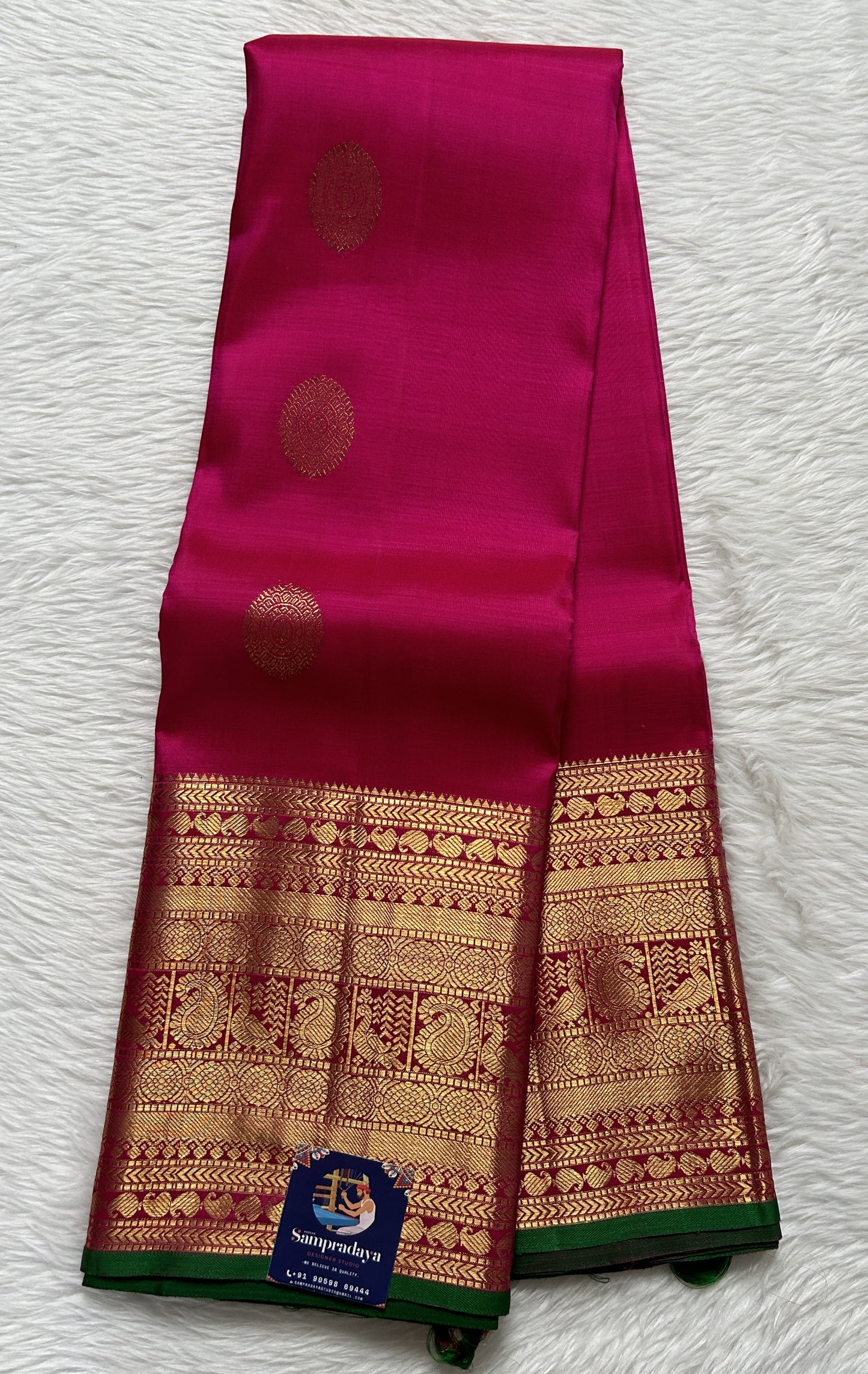 Kanjivaram Festive Silk Saree Pink colored Saree complemented with a Gold Kanchi border. - Sampradaya Designer Studio