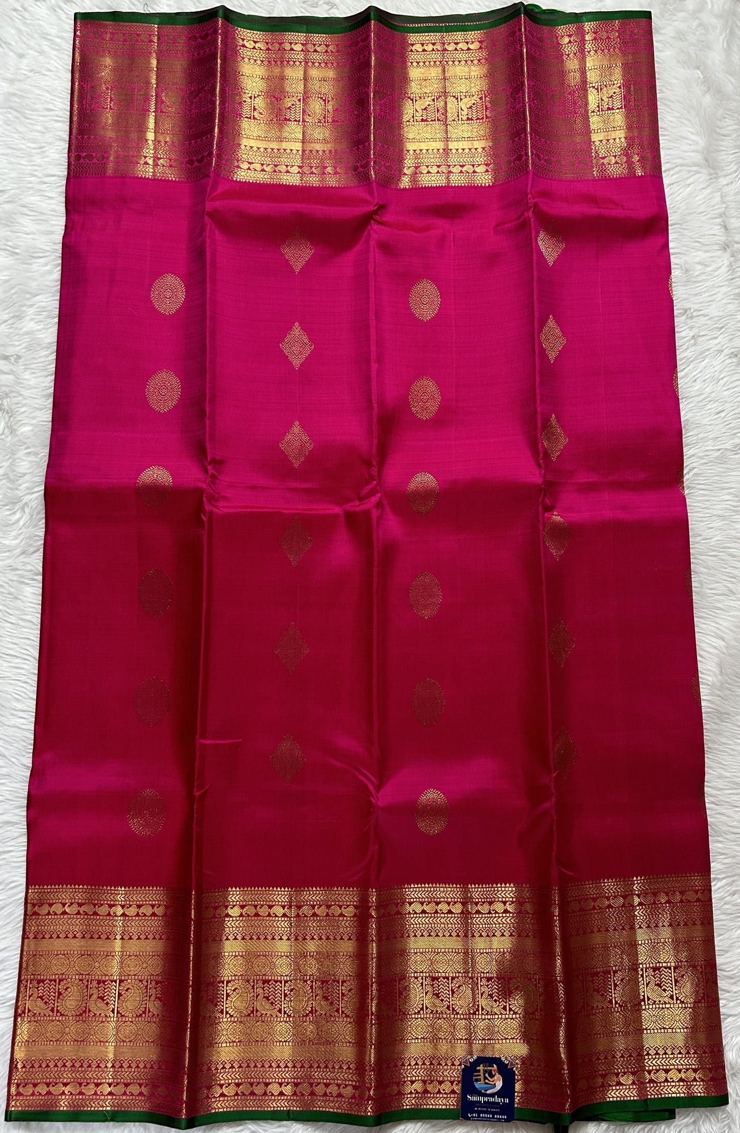 Kanjivaram Festive Silk Saree Pink colored Saree complemented with a Gold Kanchi border. - Sampradaya Designer Studio