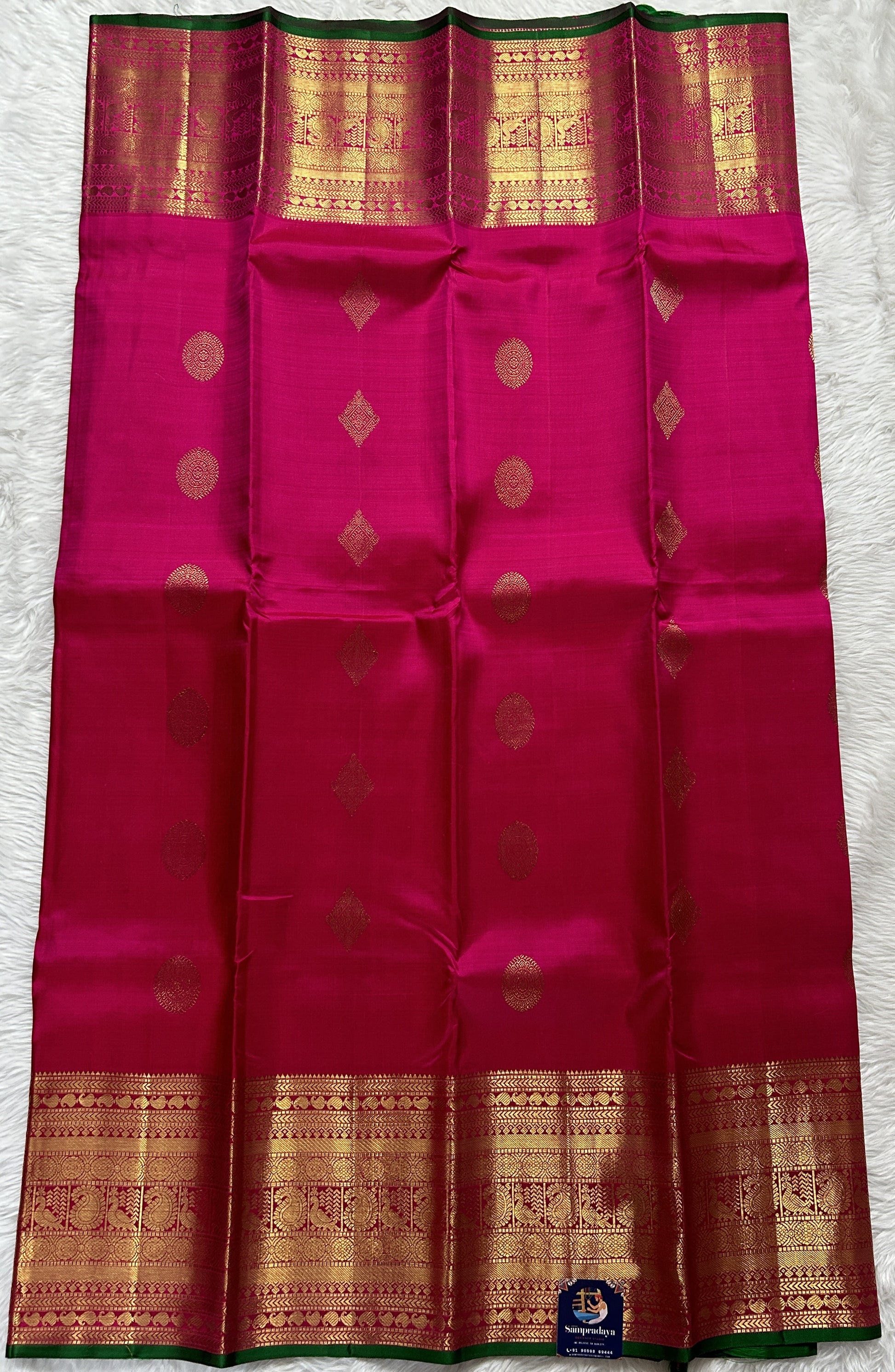 Kanjivaram Festive Silk Saree Pink colored Saree complemented with a Gold Kanchi border. - Sampradaya Designer Studio