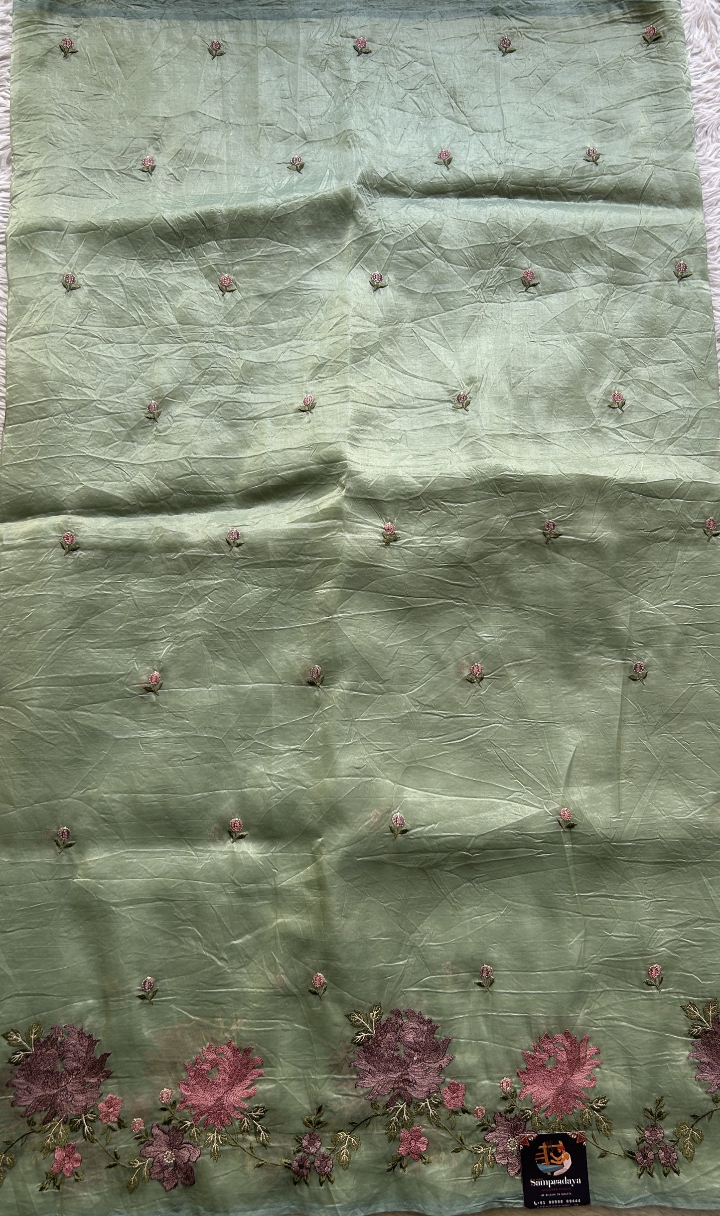Inox Silk Saree Light Green Colored Complemented with a Embroidered Border. - Sampradaya Designer Studio