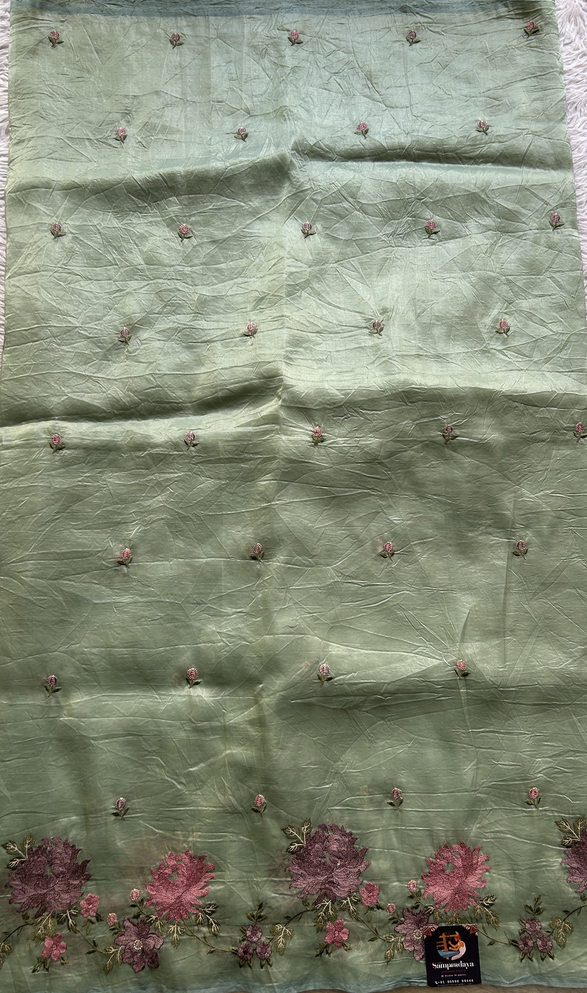 Inox Silk Saree Light Green Colored Complemented with a Embroidered Border. - Sampradaya Designer Studio