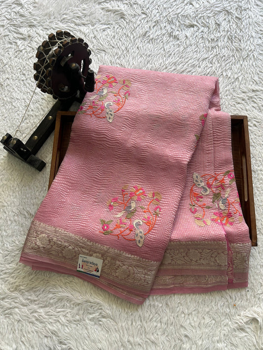 Banarasi Fancy Crushed Saree Baker Miller Pink Colored Complemented with a Silver Zari Border.